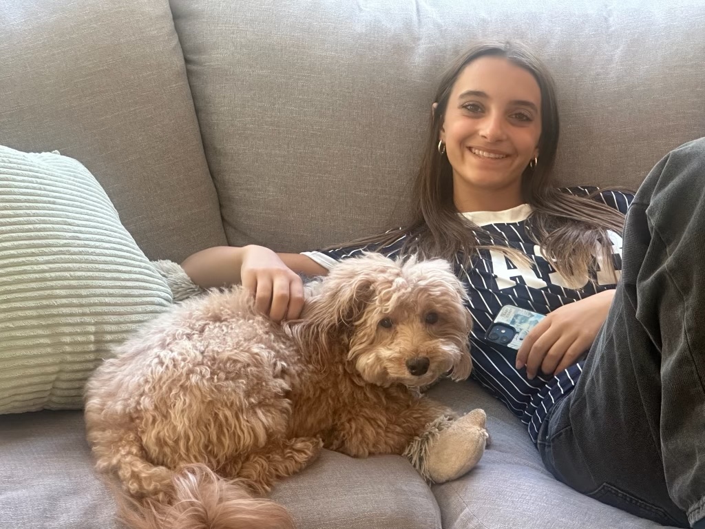Katelyn with dog on couch